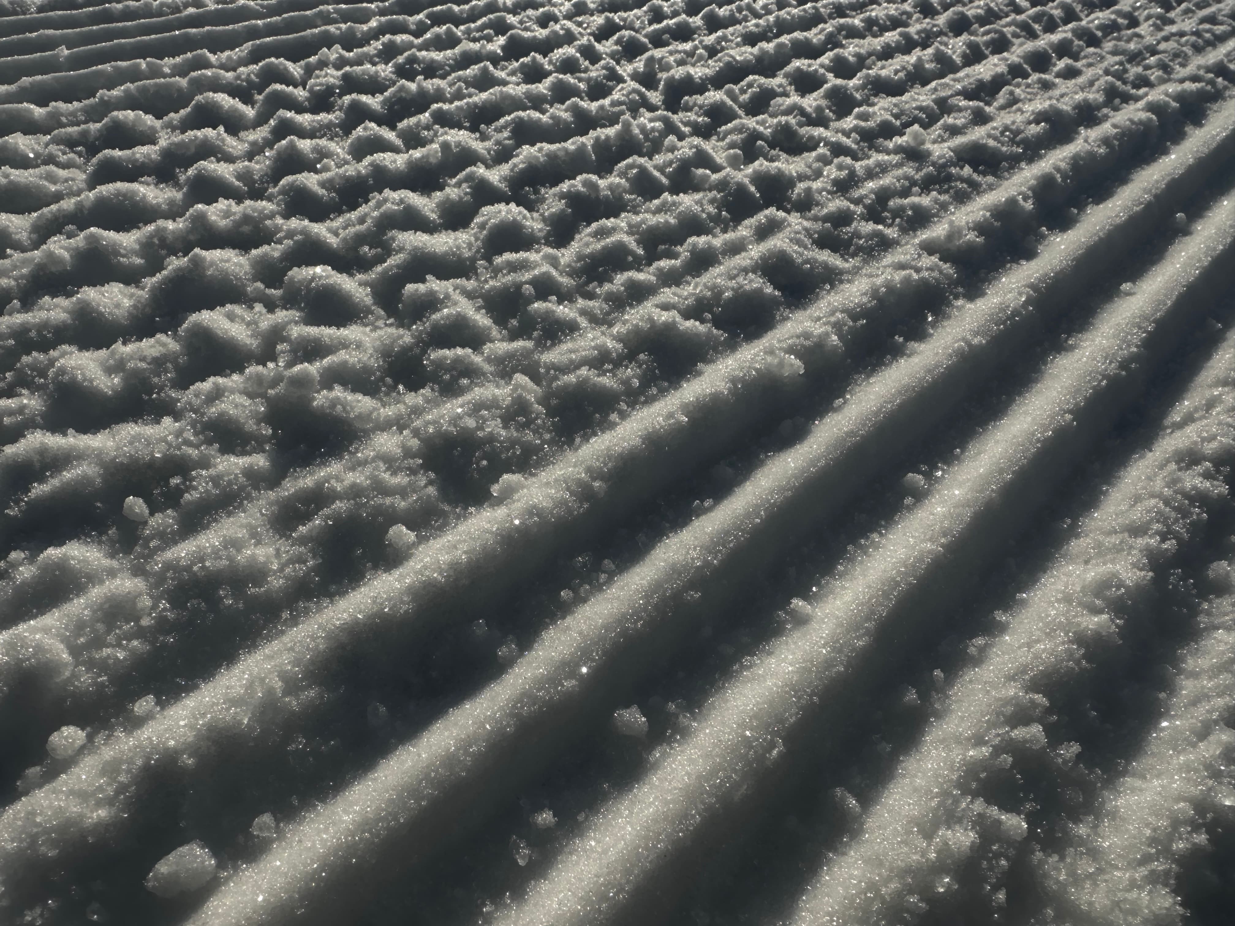Snow texture on groomed ski slope — Finnish Lapland winter conditions