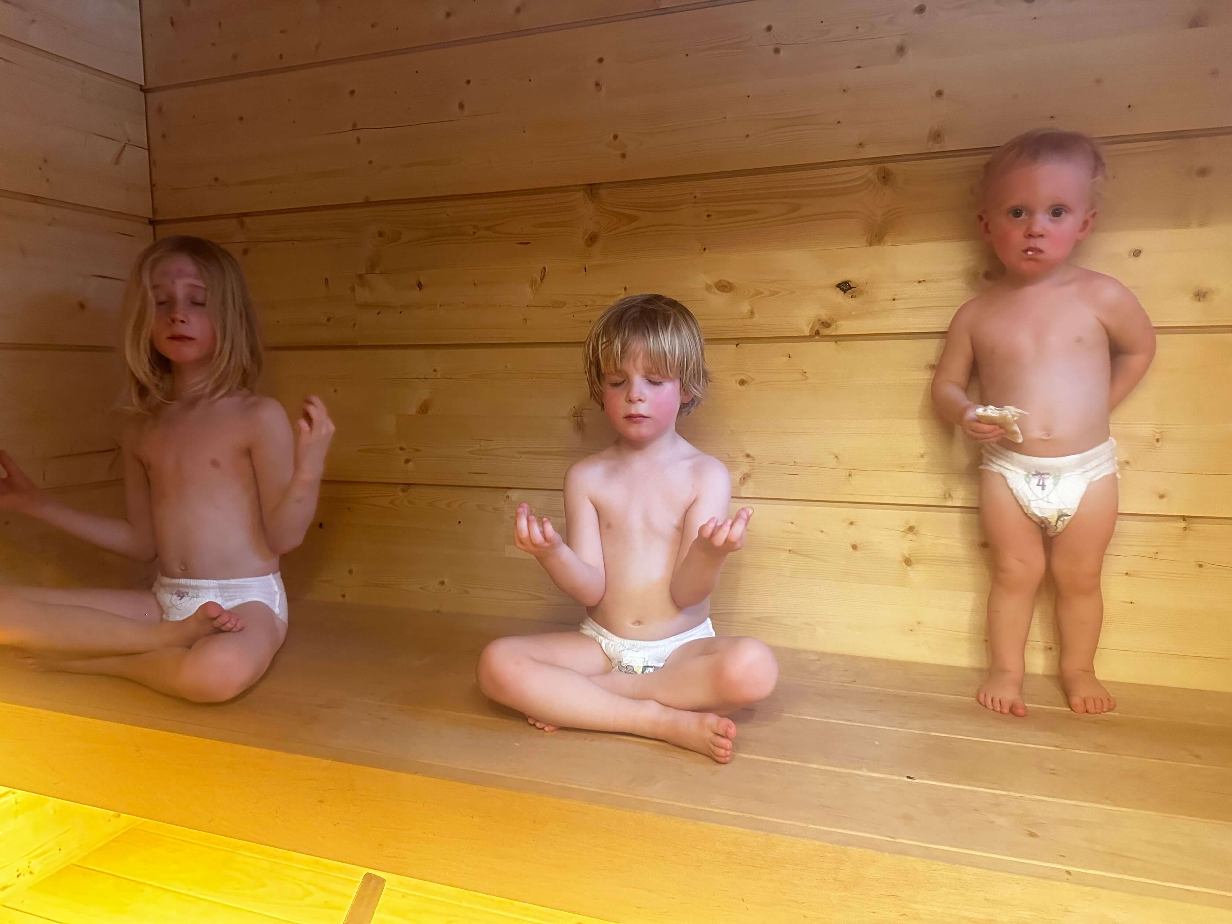 Outdoor hot tub in the snow — sauna and ice swimming in Lapland